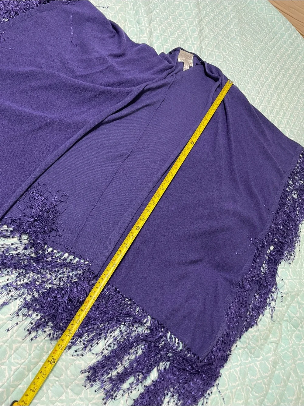 deep purple fringe, scarf, or cape
